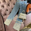 Jeans donna Valstrend con perline pesanti, dettagli scintillanti e stile industriale, mostra le gambe e il design alla moda.