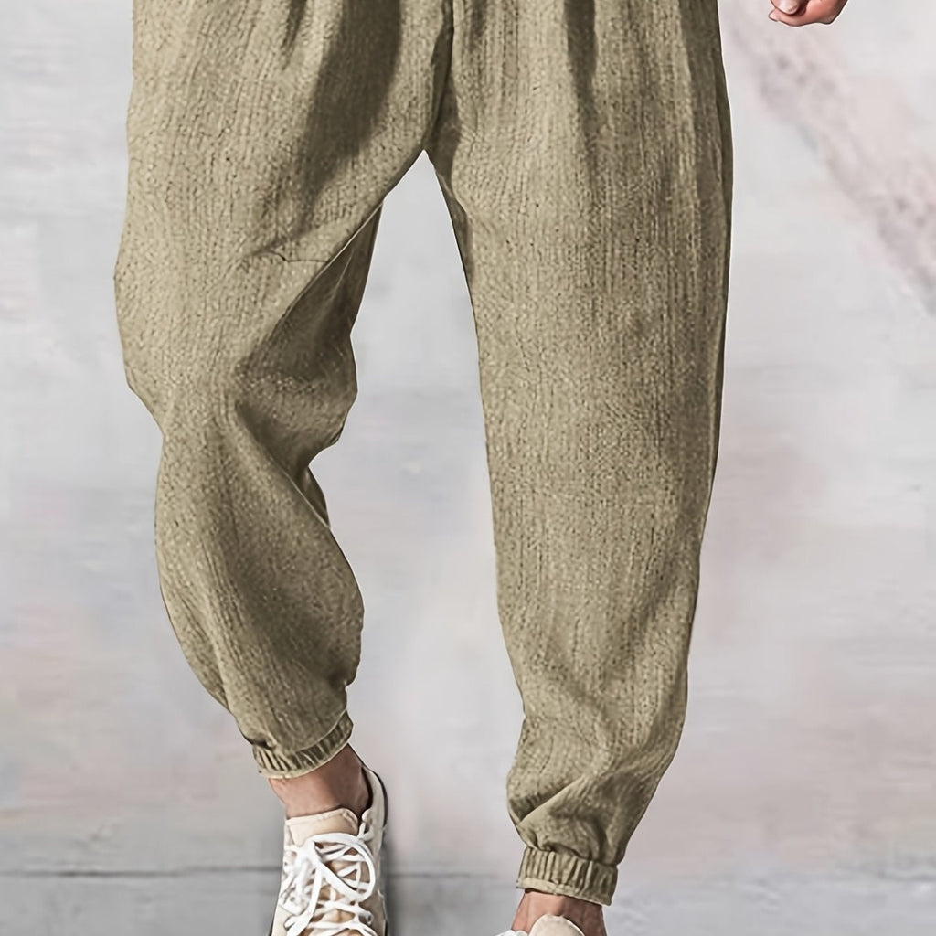 Joggers uomo Valstrend in tessuto lavato e strappato, pantaloni casual a vita bassa con tasche e cintura con coulisse.