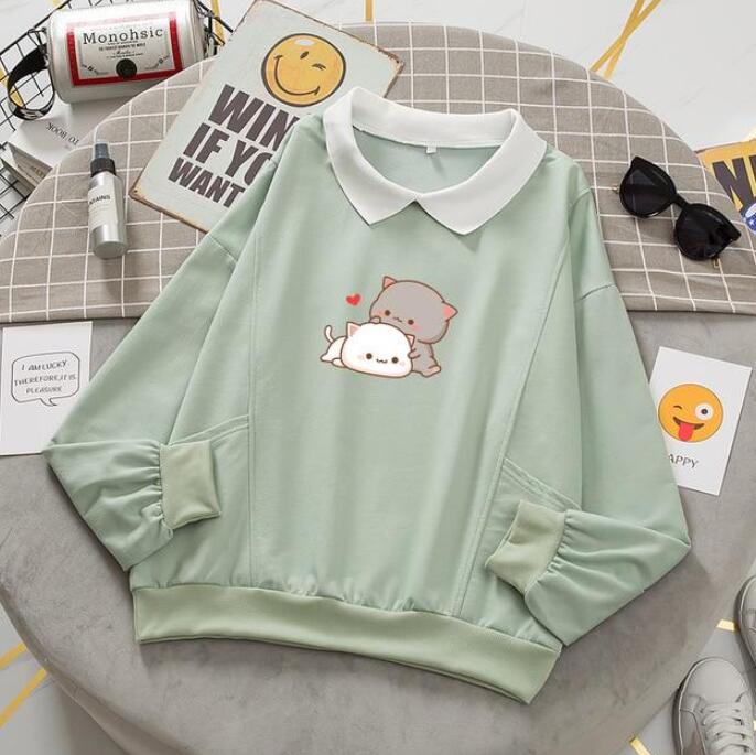 Maglione oversize Hug Peach e Gomar di Valstrend Shop con colletto sottile e stile casual, in morbido tessuto color pesca.