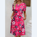 Vestito donna Valstrend a maniche corte con collo rotondo e stampa, stile casual e comodo, con tasche frontali.