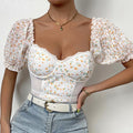 Tuta donna floreale Valstrend con ricami, patchwork e pizzo, vestibilità elegante e dettagli femminili.