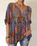 Maglietta donna Valstrend con scollo a V e stampa a colori, pullover leggero con fantasia vivace e tessuto morbido.
