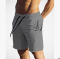Pantaloncini da allenamento in cotone per uomo di Valstrend Shop, con tasche laterali e vestibilità comoda per attività sportive.