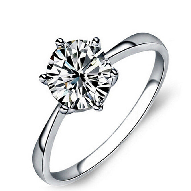 Anello in argento 925 placcato con zirconi a sei griffe, ideale come fede nuziale o regalo di nozze, di Valstrend.