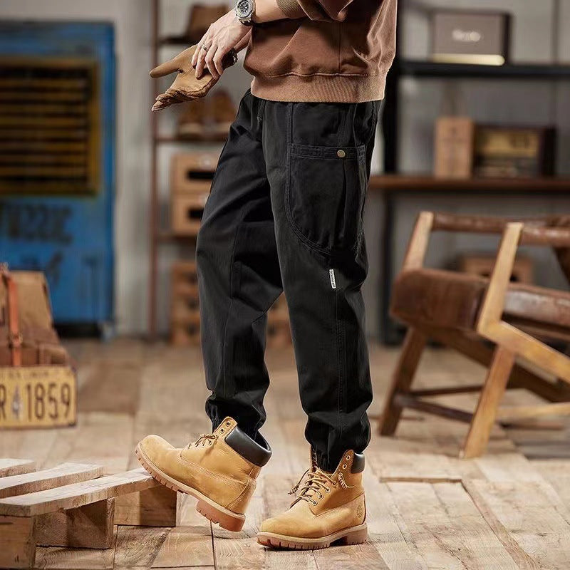 Salopette autunnale da uomo Valstrend, vestibilità ampia e comoda, tessuto morbido e stile casual, ideale per la stagione autunnale.