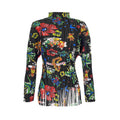 Maglia donna a maniche lunghe con colletto a pieghe e motivo floreale, marca Valstrend, visibile in dettaglio.