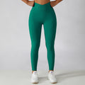 Pantaloni fitness skinny a vita alta Valstrend con tasca, effetto lifting e design in tessuto color pesca per allenamenti e corsa
