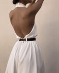 Completo jumpsuit donna in poliestere senza maniche, scollo a halter e schiena scoperta, marchio Valstrend.