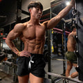 Pantaloncini corti da uomo Valstrend per fitness e sport, tessuto elasticizzato e design sportivo, ideali per allenamenti e attività fisiche
