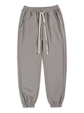Pantaloni casual semplici Valstrend shop in tessuto morbido, colore neutro, visualizzati su un manichino.
