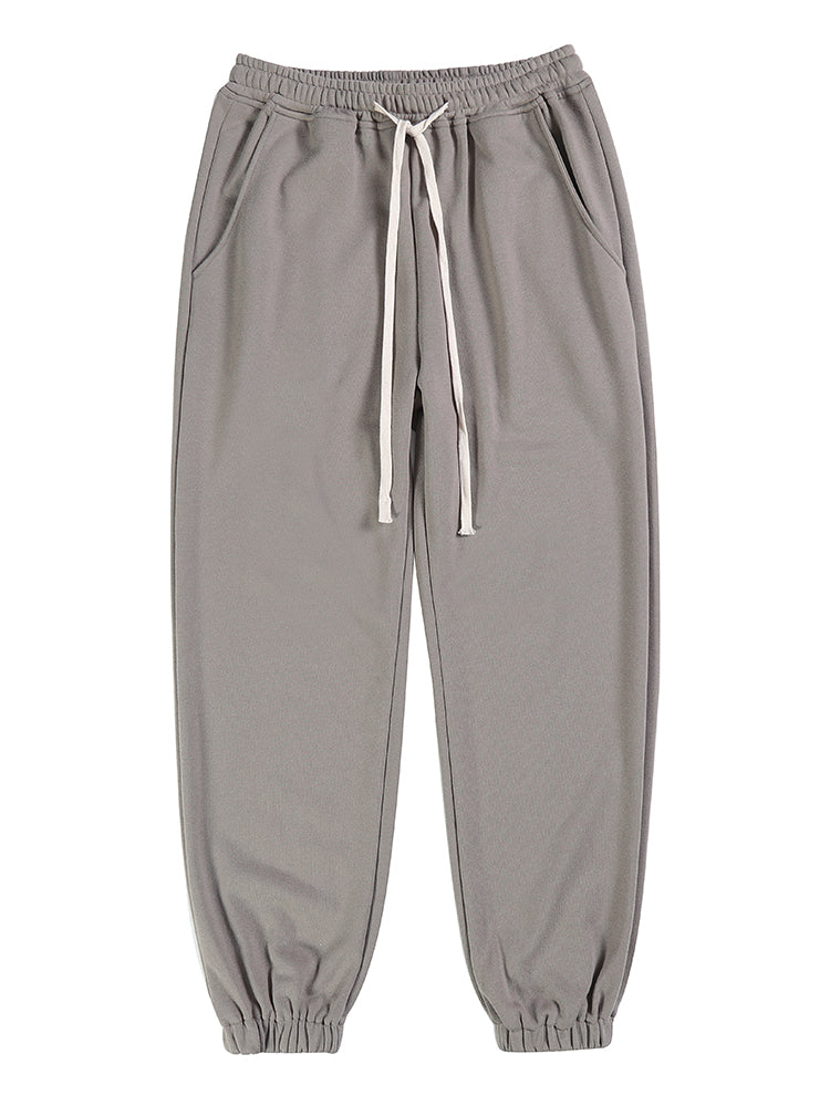 Pantaloni casual semplici Valstrend shop in tessuto morbido, colore neutro, visualizzati su un manichino.