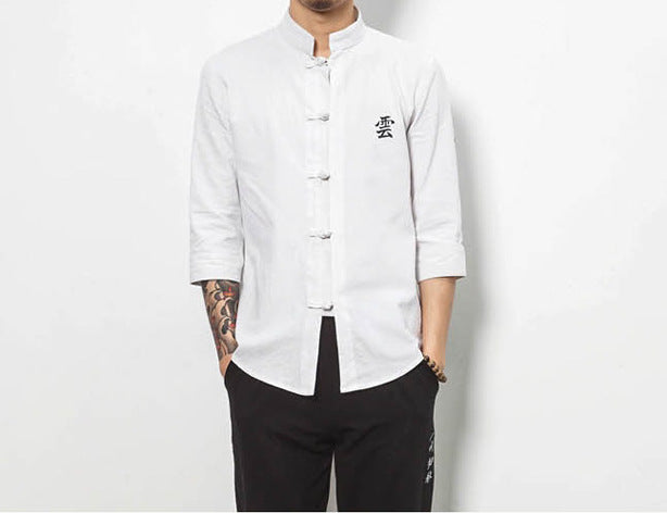 Camicia da uomo stile cinese con colletto rialzato e bottoni a rana, marchio Valstrend, in tessuto blu con motivi tradizionali.
