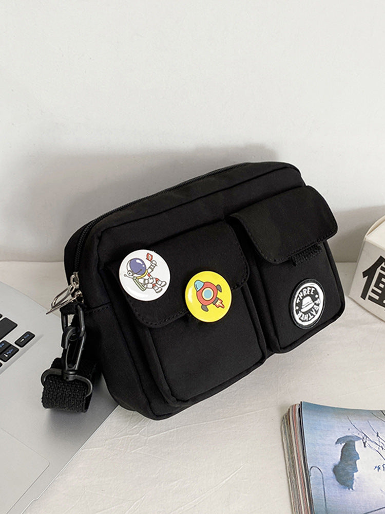 Borsa messenger da uomo Valstrend con spallaccio, tasca con badge, stile crossbody, ideale per uso quotidiano e pratico.