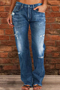 Pantaloni larghi in denim washed retrò con strappi, stile casual e trendy, marca Valstrend shop.