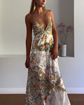 Abito lungo da donna Valstrend con stampa, orlo a sfilatura e dettaglio a tracolla, tessuto leggero e stile elegante.