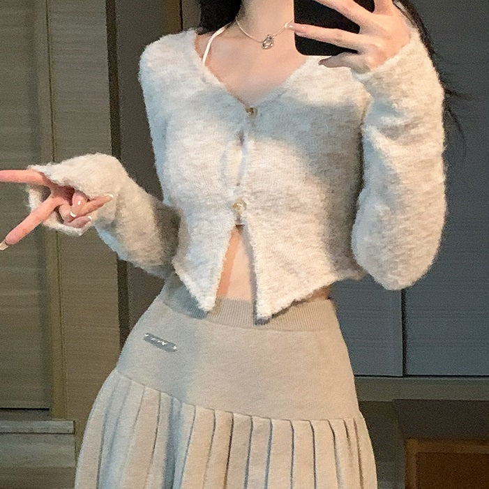 Cardigan corto in maglia per donna di Valstrend, con spalle piccole e stile giacca leggera, tessuto morbido e confortevole.