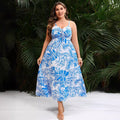 Vestito bohemien con stampa foglie Valstrend, abito lungo con fantasia floreale e dettagli eleganti, ideale per uno stile casual e chic.