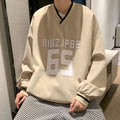 Maglione donna a V a maniche lunghe in stile baseball, giacca shell moda Valstrend, tessuto morbido e comodo.
