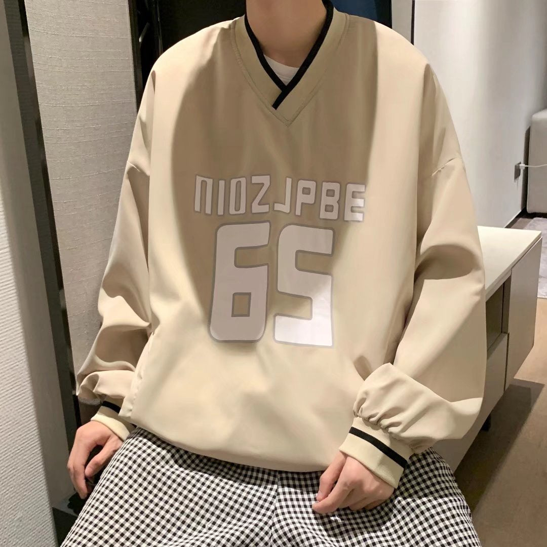 Maglione donna a V a maniche lunghe in stile baseball, giacca shell moda Valstrend, tessuto morbido e comodo.