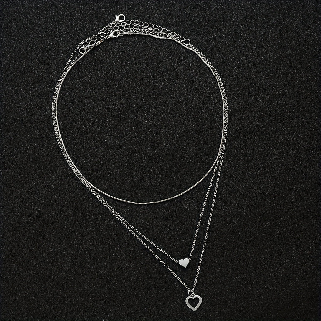 Set di collane a cuore a strati per donna, 3 pezzi, pendenti a cuore vuoto in lega di zinco, stile semplice per ogni occasione.