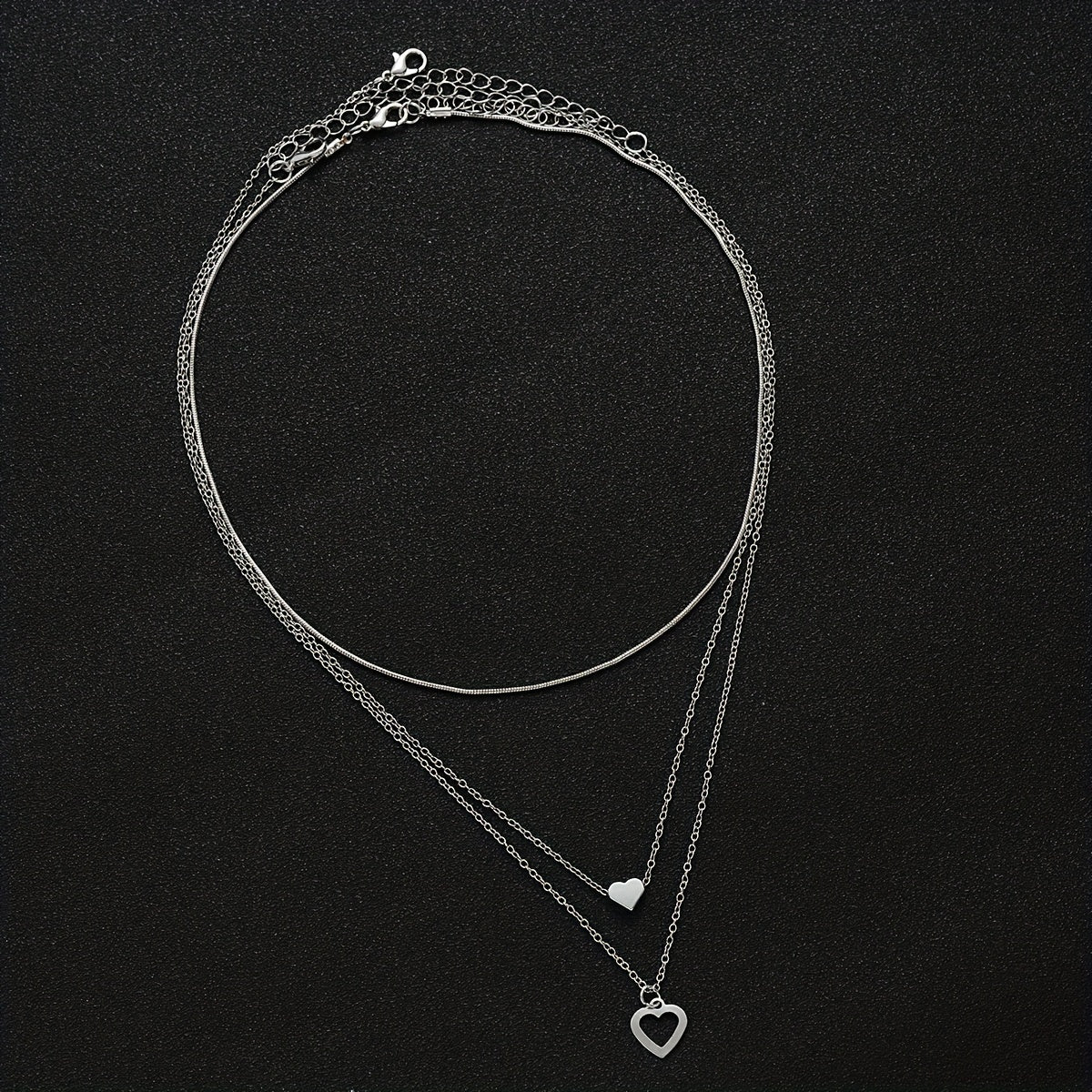 Set di collane a cuore a strati per donna, 3 pezzi, pendenti a cuore vuoto in lega di zinco, stile semplice per ogni occasione.