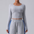 Maglietta sportiva a maniche lunghe per donna di Valstrend, tessuto elasticizzato per yoga e allenamenti.