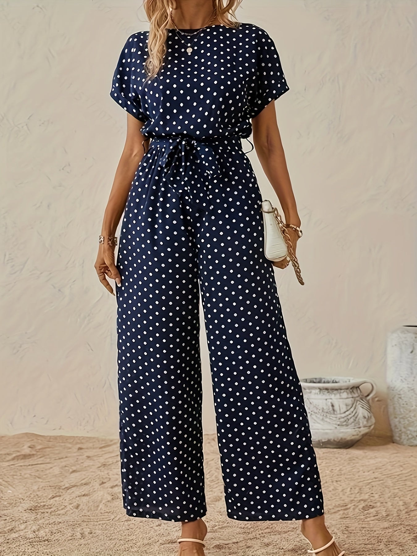 Tuta donna con stampa a pois, scollo rotondo e maniche corte, perfetta per primavera ed estate, marchio Valstrend.