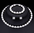 Set di gioielli nuziali Valstrend con collana, bracciali ed orecchini in perle di 8 mm e strass, per cerimonia elegante