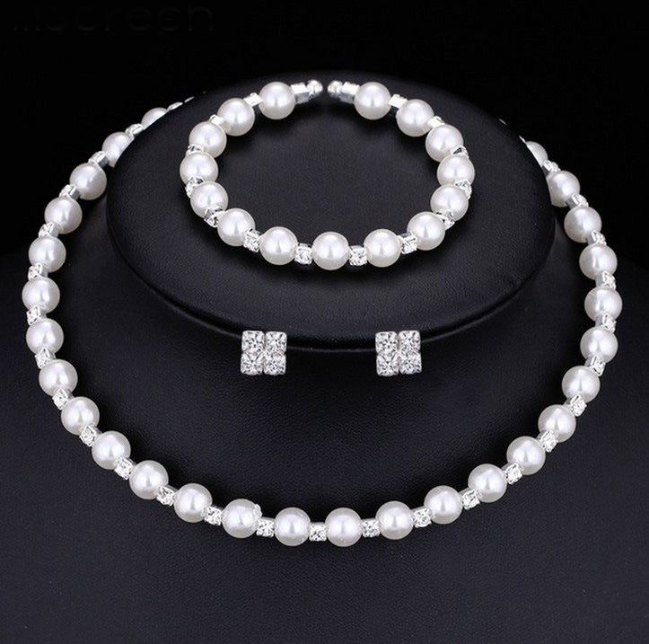 Set di gioielli nuziali Valstrend con collana, bracciali ed orecchini in perle di 8 mm e strass, per cerimonia elegante
