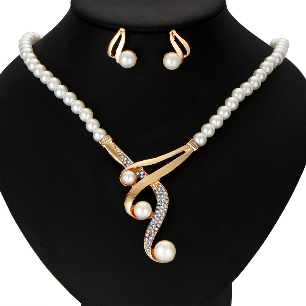 Collana e orecchini con perle in stile europeo e statunitense, gioielli di lusso Valstrend, set di gioielli eleganti.