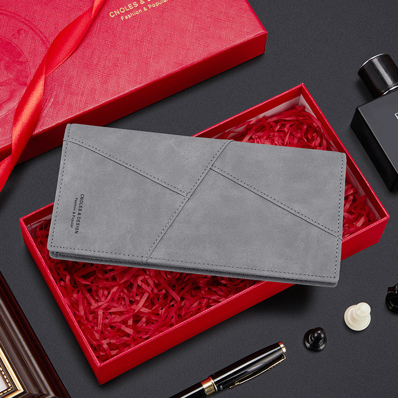 Portafoglio maschile Valstrend, lungo e multifunzionale, con scomparti per carte e contanti, in pelle nera elegante.