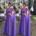Vestito lungo con scollo a V profondo e vita alta, modello Valstrend, in tessuto elegante e aderente.