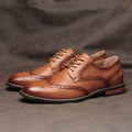 Scarpe classiche da uomo Valstrend, scarpe business con dettaglio brogue, pelle nera e suola resistente.