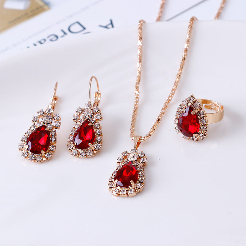 Set di collana, orecchini e anello con cristalli a goccia d'acqua, brilla con dettagli in strass, di Valstrend Shop.