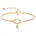 Bracciale moda Valstrend con lettere in rilievo in zirconia e dettagli in rame, stile elegante e alla moda.
