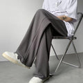 Pantaloni uomo estivi a pieghe in tessuto ice silk a gamba larga, texture leggera e traspirante, marca Valstrend.