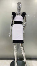 Vestito senza maniche bianco e nero con fiocco sulle spalle, stile coordinato, marchio Valstrend shop, mostra dettaglio e design elegante