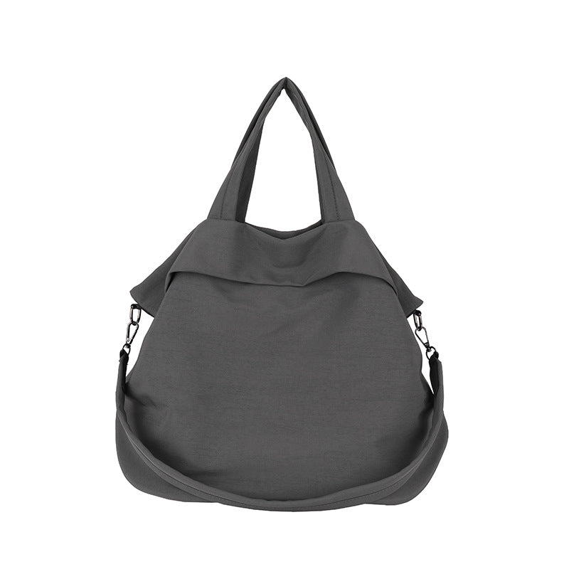 Zaino messenger casual grande capacità Valstrend, ideale per studenti, lavoro e pendolari, con design alla moda e spazio per oggetti.