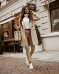 Cappotto di lana da donna a metà lunghezza con bottoni, stile classico e caldo, marchio Valstrend shop, indossato in un'immagine.