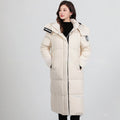 Giacca invernale da donna Valstrend, imbottita e con cappuccio, stile casual a metà lunghezza, ideale per climi freddi.