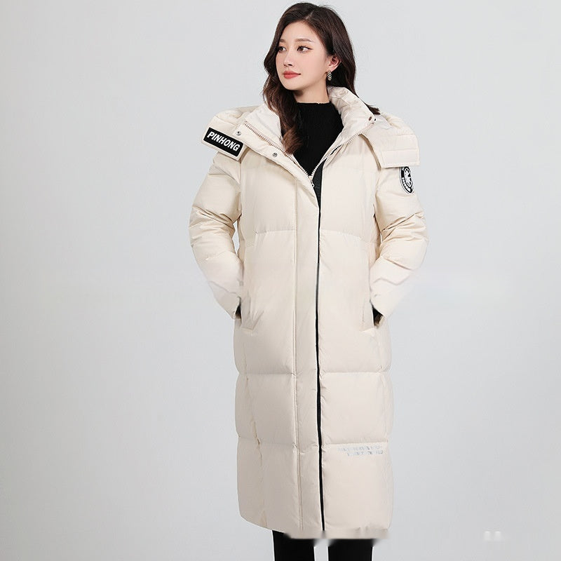 Giacca invernale da donna Valstrend, imbottita e con cappuccio, stile casual a metà lunghezza, ideale per climi freddi.