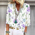 Top femminile Valstrend con fantasia floreale, scollo a V, stile casual e fashion, ideale per look estivi e informali.