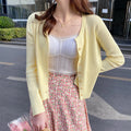 Maglione corto in seta ice con protezione solare, scollo a V, top leggero Valstrend, ideale per protezione e stile estivo.