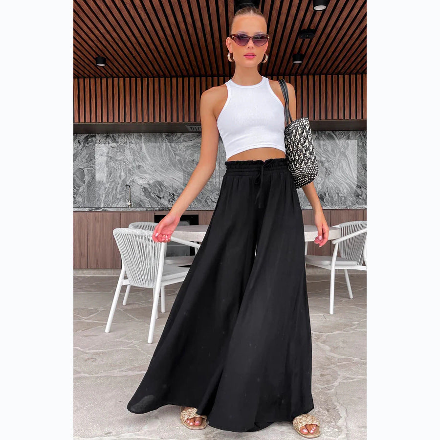 Pantaloni donna a vita elastica e gamba larga in stile casual, marchio Valstrend shop, tessuto leggero e comodo.