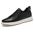 Scarpe da uomo Valstrend, scarpe invisibili con rialzo discreto, dettaglio delle suole e stile elegante in primo piano.
