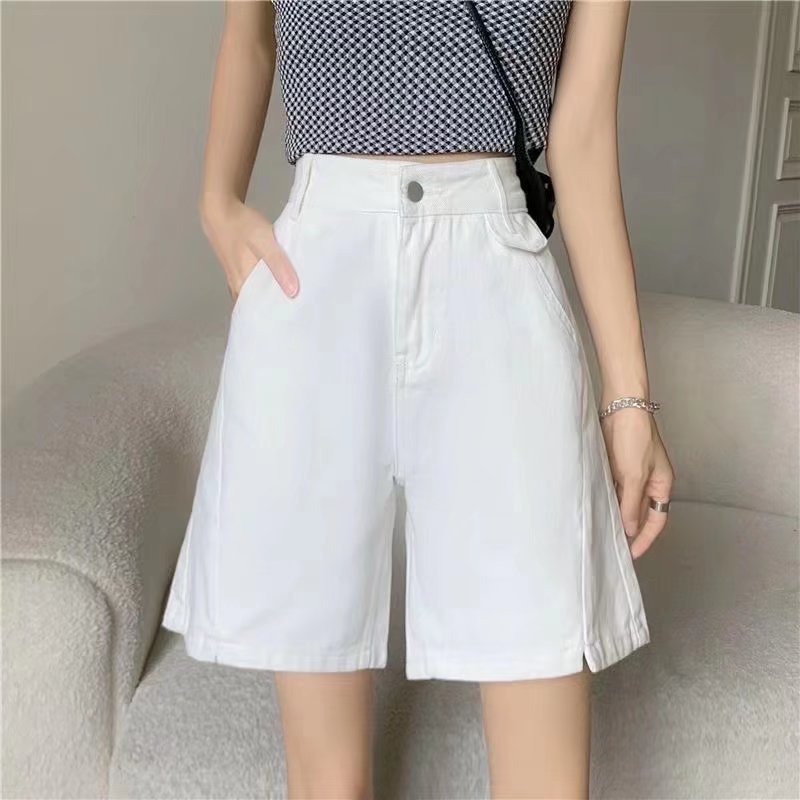 Pantaloni jeans donna Valstrend con gamba dritta larga e apertura a pantaloncino, dettaglio visibile sull'immagine.
