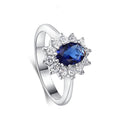 Anello di fidanzamento di alta qualità Valstrend con zirconia blu, oro giallo e design elegante, perfetto per proposte di matrimonio.