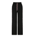 Pantaloni casual donna Valstrend con vita elastica a fiocco, dettagli in pizzo e motivo allacciato, comodi e eleganti.
