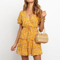 Vestito estivo Valstrend con scollo a V, vita alta, maniche corte, volant in chiffon floreale.