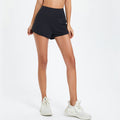 Shorts sportivi da donna Valstrend con vita alta, tessuto rapido asciugatura e design anti-esposizione per allenamenti.